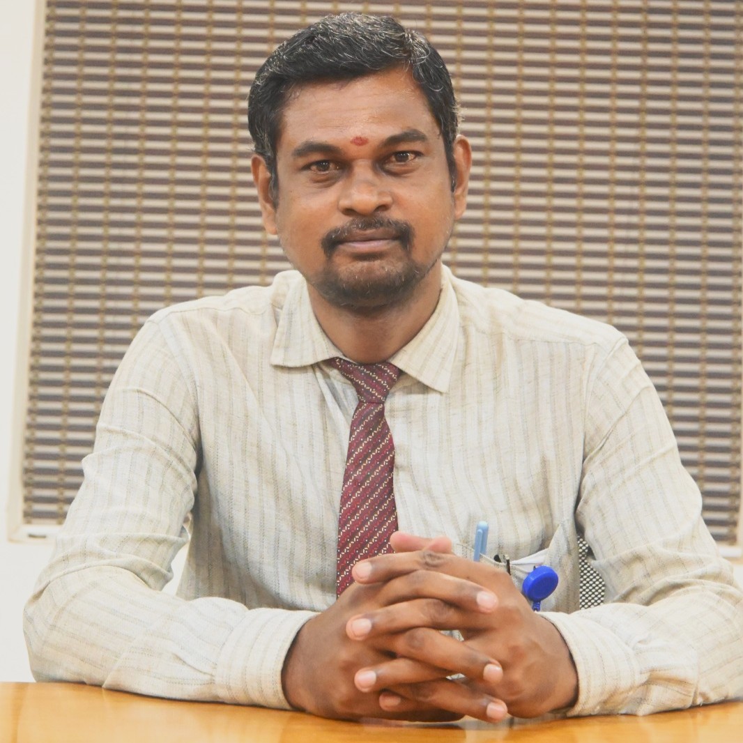 Dr.R.Kutti Mani